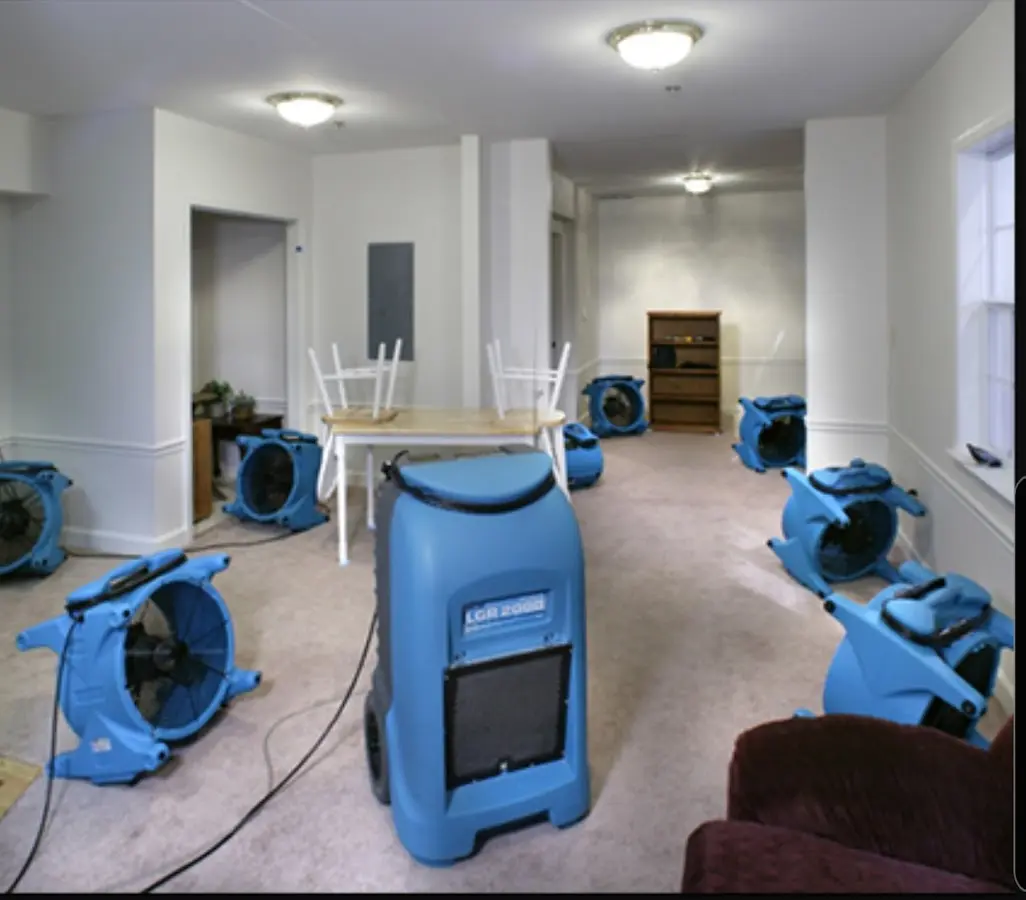 Air movers and dehumidifier setup for Water Extraction & Removal in Blackwell